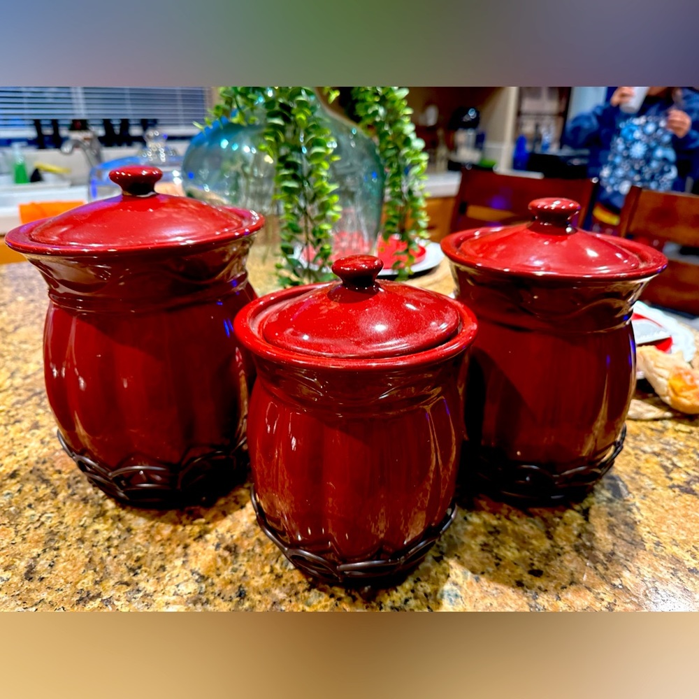 3 canisters brand is from Home Interior.